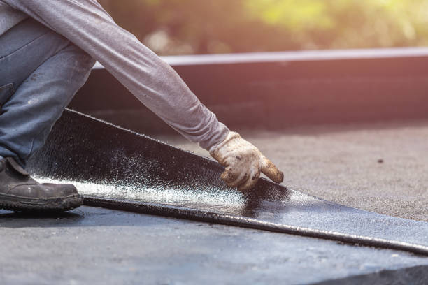 Professional Basement Waterproofing technician working in Tonawanda, NY